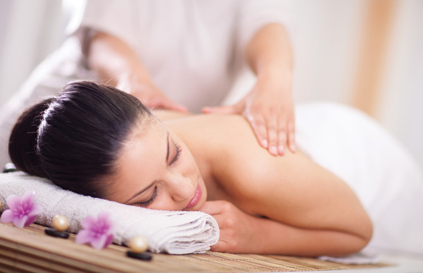  woman having a wellness back massage - Foto, Imagen