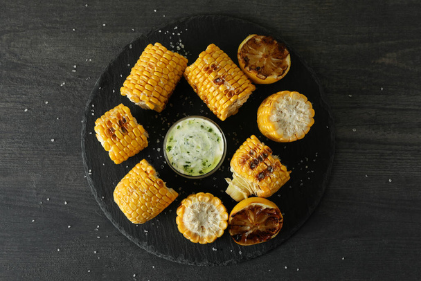 Concept of tasty food with grilled corn - Photo, Image