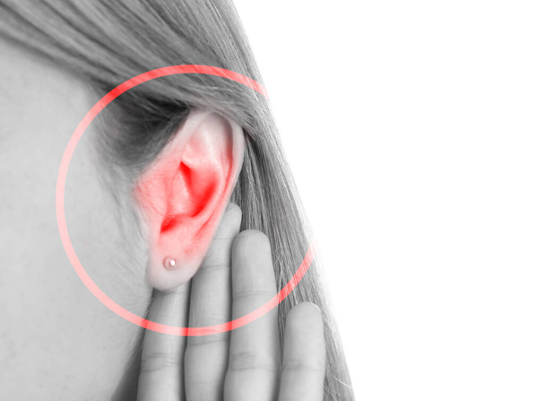 Woman suffering from earache, closeup. Black and white tone - Фото, зображення