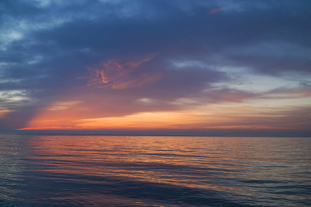 Dawn over the Black Sea in Odessa. - Zdjęcie, obraz