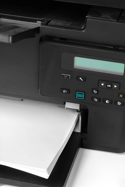 Close up of printer printing documents - Zdjęcie, obraz