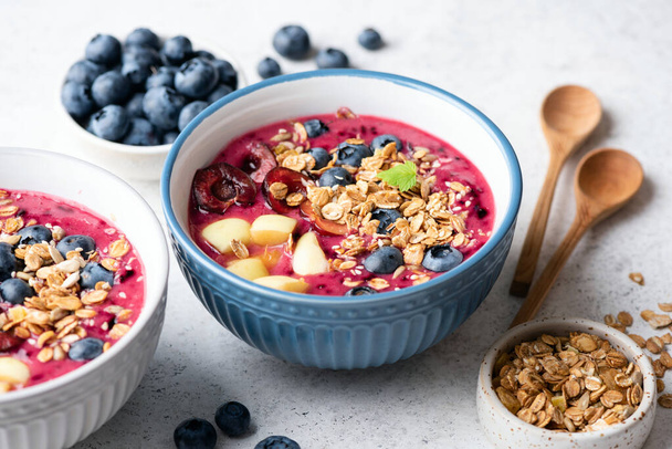 Healthy superfood blueberry smoothie bowl - Фото, изображение