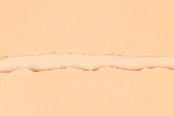 Beige torn paper background with clipping path - Foto, afbeelding