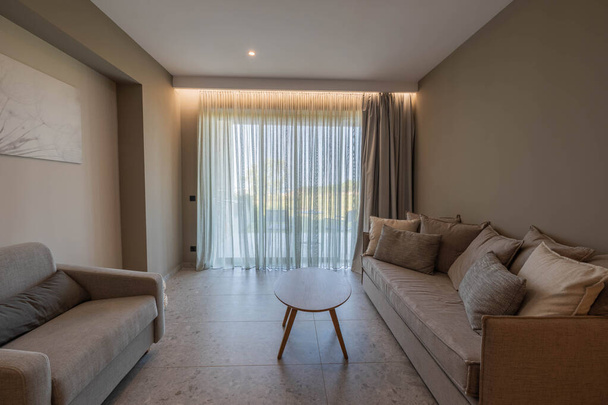 Beautiful interior view of contemporary hotel room. Greece. Nea Potidaea. 07.20.2021. - Fotoğraf, Görsel