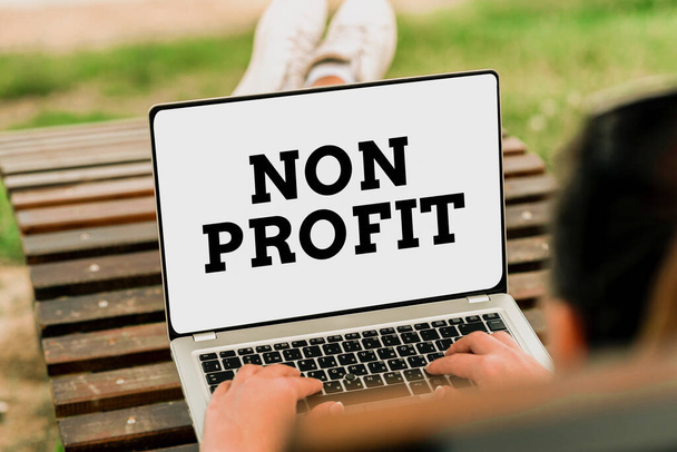 Writing displaying text Non Profit. Business approach an activity not making or conducted primarily for a profit Voice And Video Calling Capabilities Connecting People Together - Photo, Image