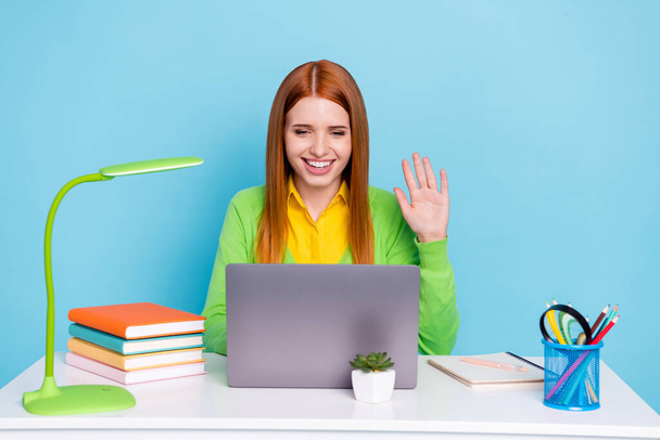 Photo of young smart millennial lady work from home wear green sweater isolated on blue color background - Fotoğraf, Görsel