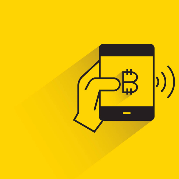 黄色の背景に影のあるスマートフォンでのビットコイン決済 - ベクター画像