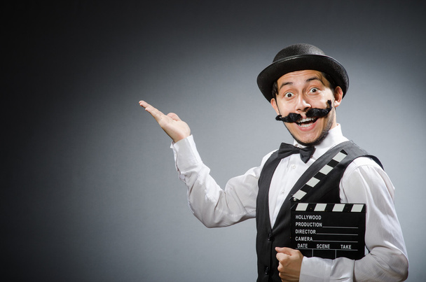 Man with movie clapper board - Photo, Image