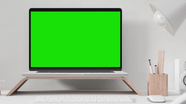 Στιγμιότυπο οθόνης ενός ανοιχτού φορητού υπολογιστή που κάθεται πάνω από ένα γραφείο - Πλάνα, βίντεο