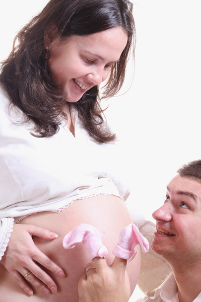 glückliche schwangere Frau mit einem liebenden Ehemann - Foto, Bild