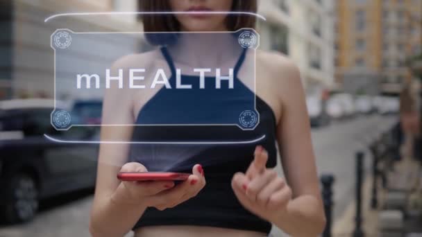 Jonge volwassene interageert hologram mHEALTH - Video