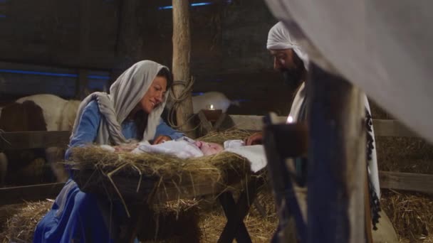 Mary And Joseph with baby Jesus in barn - Footage, Video