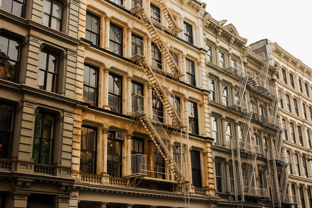Architectural details and fire escapes in Soho, Manhattan, New York City - Fotoğraf, Görsel