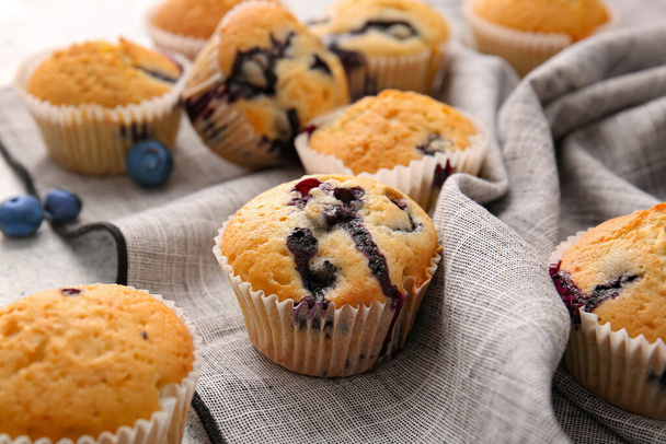 Tasty blueberry muffins on table, closeup - Photo, Image