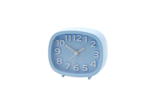 A closeup of a blue alarm clock isolated on white background - Zdjęcie, obraz