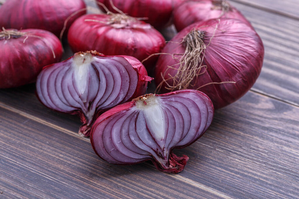 red onions on rustic wood - Photo, image