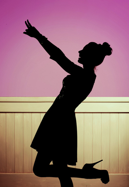 Alluring girl in the dancing pose - Valokuva, kuva