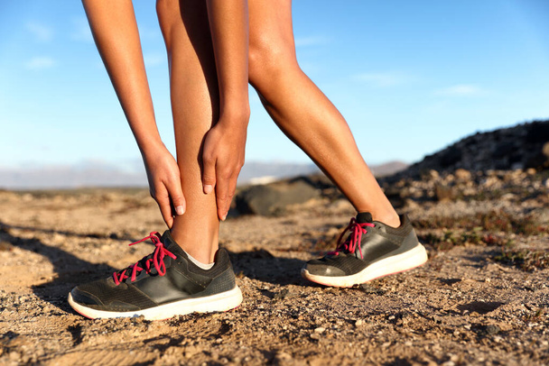 Sprained ankle running injury athlete runner woman - Φωτογραφία, εικόνα