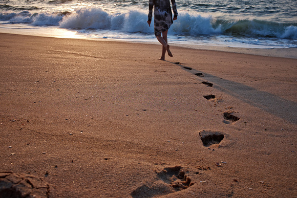 Footprints on the beach sand - Zdjęcie, obraz