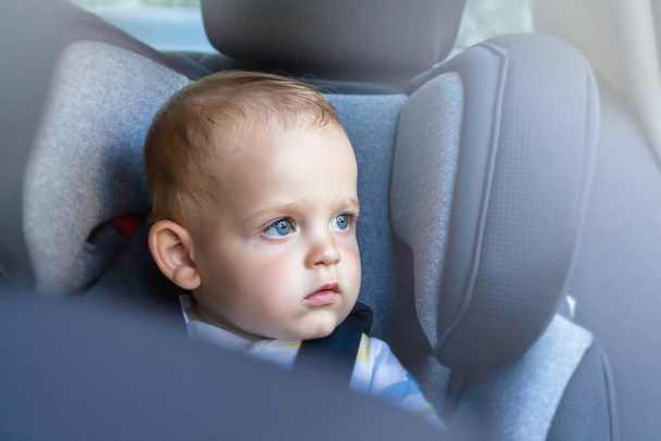 Baby boy in car seat. Child safety  - Photo, Image