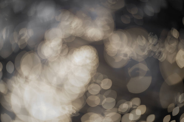 Some bokeh lights on a blurry background - Φωτογραφία, εικόνα