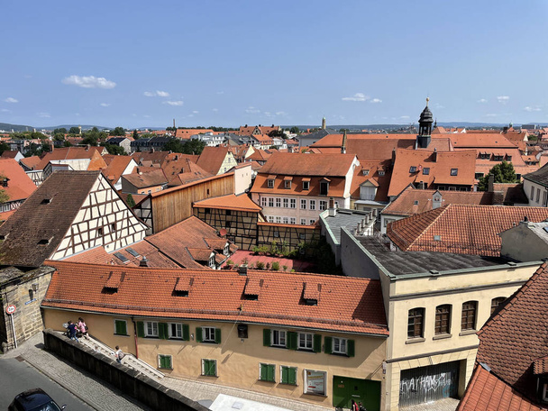 A beautiful view of small houses with red slate roofs near Cathedral Bamberg in Germany - Фото, зображення