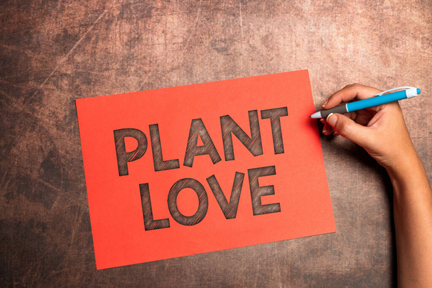Концептуальний підпис Plant Love. Бізнес-підхід символ емоційної любові, догляду та підтримки, показаний іншим Написання важливих приміток Намальовування нових дизайнерських композиційних літерних ідей
 - Фото, зображення