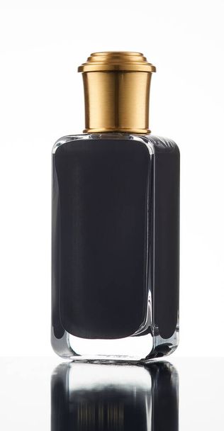   Elegant black design glass jar of perfume isolated on white background.                              - 写真・画像