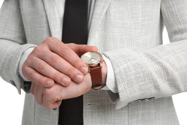 Businessman wearing wristwatch, closeup view. Time management - Foto, imagen
