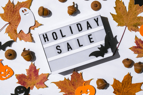 Lightbox with text HOLIDAY SALE, Halloween autumn leaves decorations Sale shopping concept. Online shopping Template Black friday sale mockup fall thanksgiving promotion advertising Big sale. Cyber monday. Holiday - Photo, Image