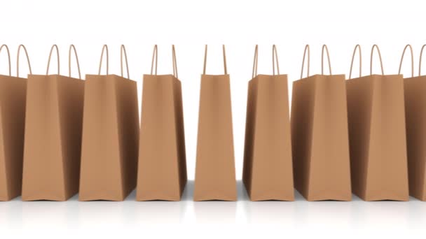 Retail paper shopping bag in the online store isolated on the white background - Imágenes, Vídeo