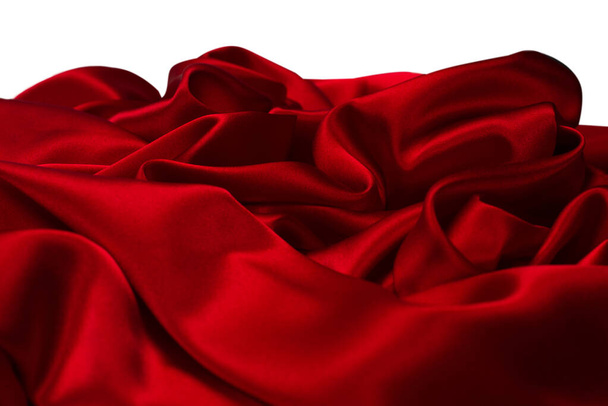 Багатий і розкішний фон з текстури червоної шовкової тканини. Вид зверху
. - Фото, зображення