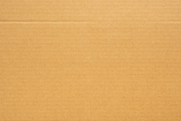 Fondo de textura de hoja de papel de cartón reciclado ecológico marrón - Foto, imagen
