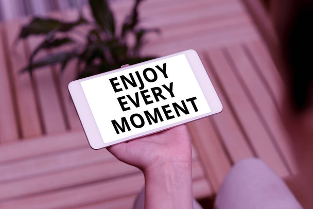 Text sign showing Enjoy Every Moment. Business approach stay positive thinking for personal development Voice And Video Calling Capabilities Connecting People Together - Photo, Image