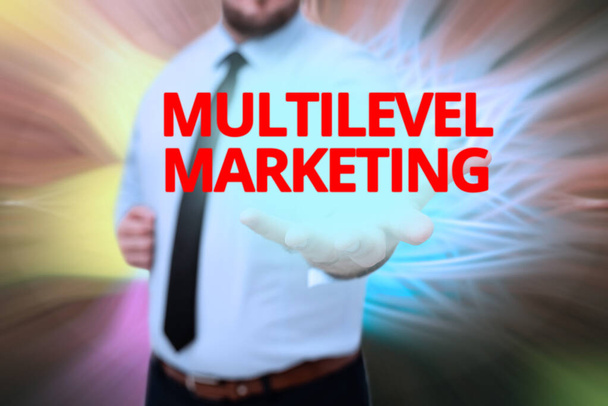 Writing displaying text Multilevel Marketing. Business overview marketing strategy for the sale of products or services Gentelman Uniform Standing Holding New Futuristic Technologies. - Photo, Image