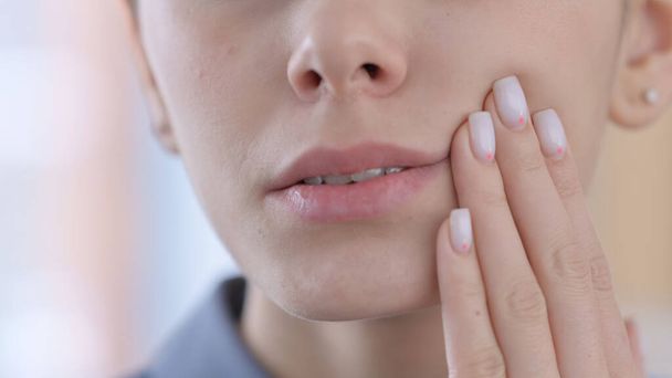 Face Close Up of Latin Woman having Toothache, Cavity  - Fotó, kép