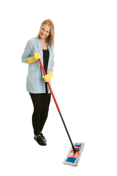 Cheerful woman having fun while cleaning - Foto, afbeelding