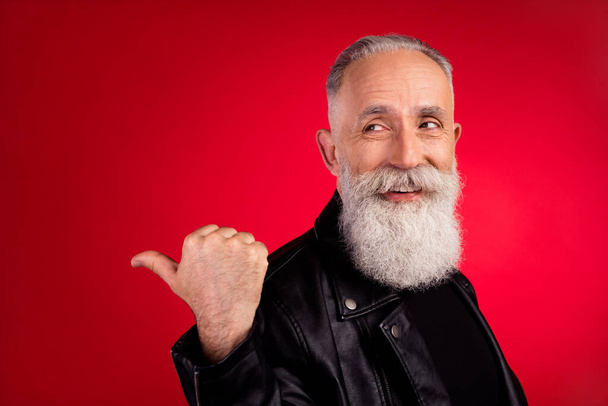 Profile side photo of aged man happy smile indicate thumb empty space select suggest advert sale isolated over red color background - Fotó, kép