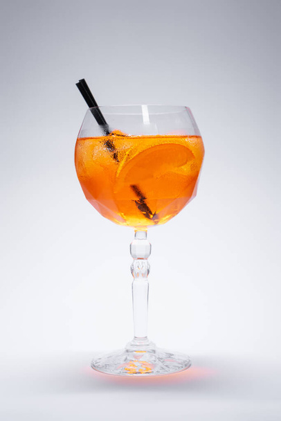 aperol spritz cocktail drink with orange and ice in glass on white background - Φωτογραφία, εικόνα