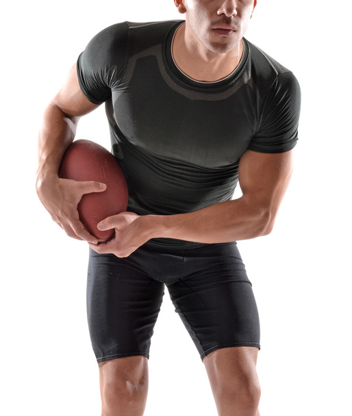 Man holding a rugby ball - Foto, Imagem