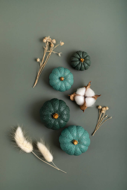 Collection of handmade plaster pumpkins. Autumn seasonal holidays background in natural colors. DIY craft pumpkins for helloween, thanksgiving, fall decoration - Photo, Image