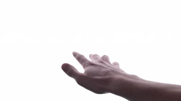 Людина робить жест рукою з яскравим білим тлом
 - Кадри, відео
