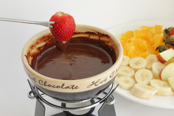 chocolade fondue met fruit - Foto, afbeelding