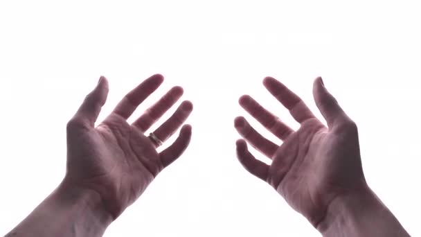 La personne fait un geste de main avec un fond blanc vif - Séquence, vidéo