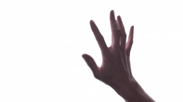 Persona hace gesto de la mano con brigh fondo blanco - Imágenes, Vídeo