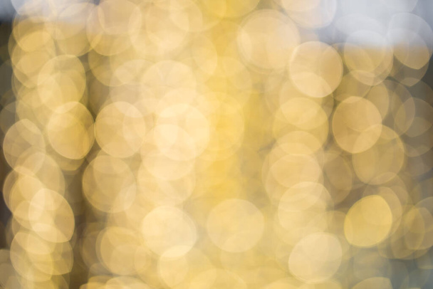 A blurred yellow bokeh light background - Fotoğraf, Görsel