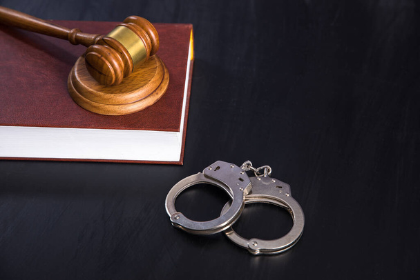 law concept, judge gavel with book and handcuff - Foto, immagini