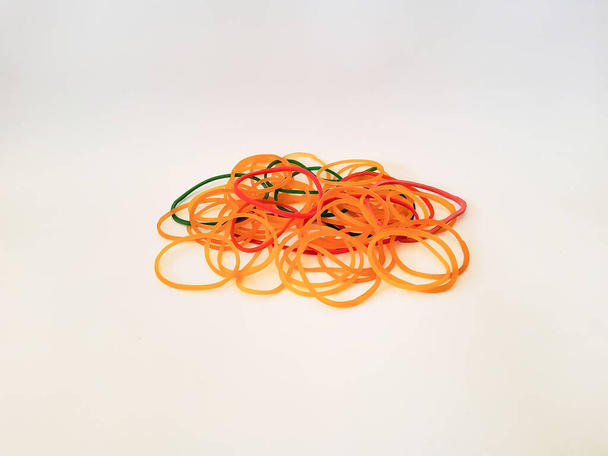 a pile of colorful rubber bands - Fotó, kép