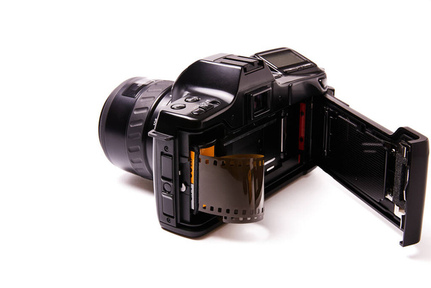 Analog black camera with 35mm photo reel - Photo, Image