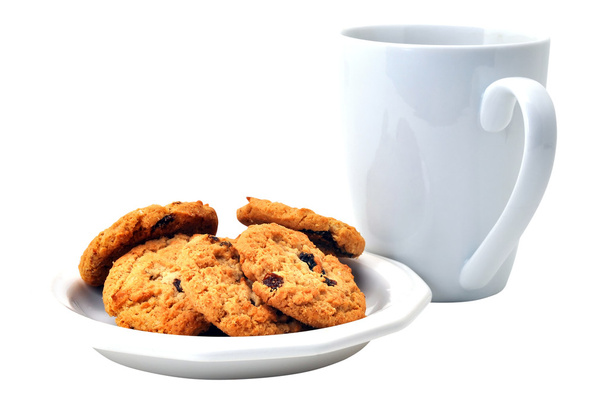 ovesné sušenky na desku a káva izolovaných na bílém pozadí s ořezovou cestou. - Fotografie, Obrázek